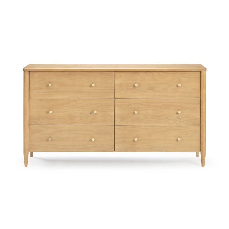 Six-drawer light wood dresser with tapered legs and round brass knobs, Scandinavian mid-century modern bedroom storage