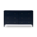 Navy blue six-drawer wooden dresser with round brass knobs and tapered legs, mid-century modern bedroom storage dresser