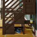 Wooden diagonal‑slatted staircase with built‑in under‑stair storage featuring blue sneakers, yellow wire basket, small succulent in a white-and-yellow pot, striped mustard rug and a glimpse of a home office desk