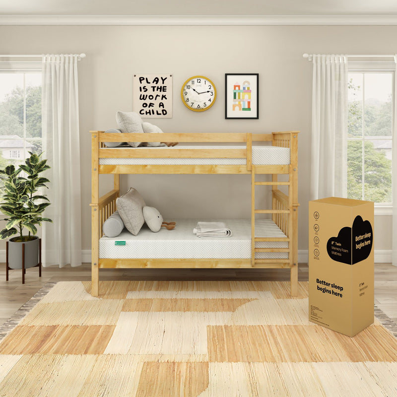 Natural wood twin bunk bed in bright kids' bedroom with boxed memory foam mattress, neutral decor, play-themed wall art and potted plant