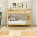 Natural pine twin bunk bed in modern kids' bedroom with ladder, neutral bedding and pillows, playful wall art, clock, sheer curtains and rug