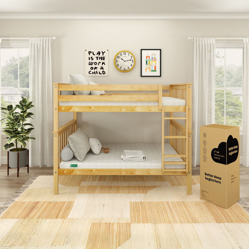 Natural wood bunk bed with twin mattresses in bright kids' bedroom, framed wall art and boxed memory-foam mattress