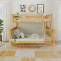 Light natural pine kids' bunk bed with ladder, neutral mattresses and wall art in a modern space-saving children's bedroom