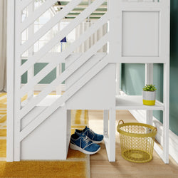 White wooden loft bed with diagonal slats in modern kids bedroom, storage shelves with yellow potted succulent, blue sneakers tucked underneath, yellow wire laundry basket on hardwood floor and mustard area rug