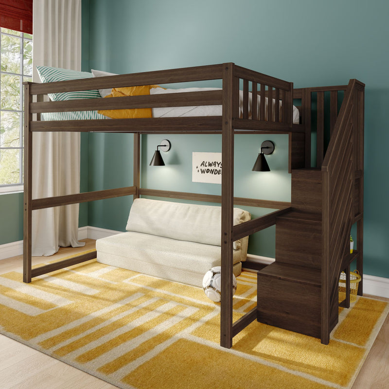 Dark wood loft bed with stairs over white sofa, teal painted walls, yellow geometric rug, wall reading lamps and soccer ball in kids' bedroom
