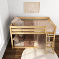 Natural wood twin-over-twin bunk bed with ladder, neutral beige gingham bedding and plush throws in a modern kids' bedroom