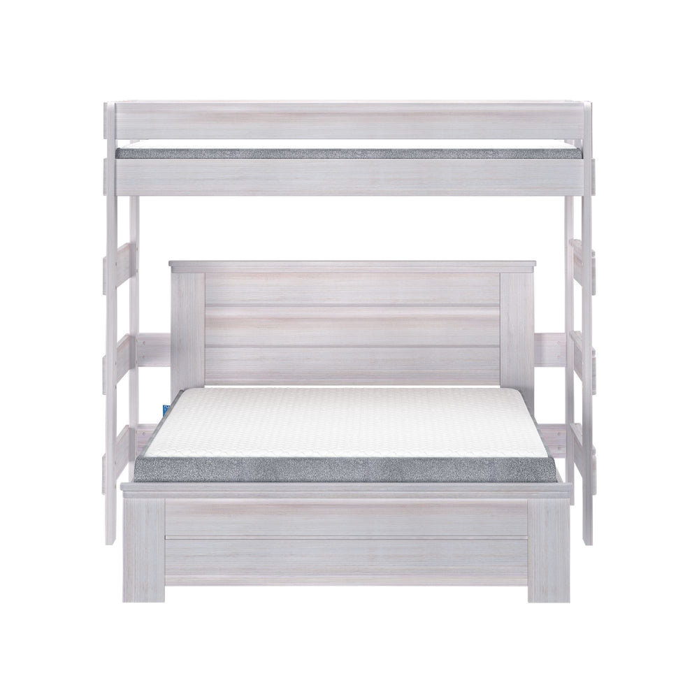 White wood twin over full bunk bed with ladder and mattresses.