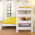Whitewashed wood kids bunk bed with bright yellow bedding in sunlit children's bedroom with yellow gingham wallpaper and black-framed window