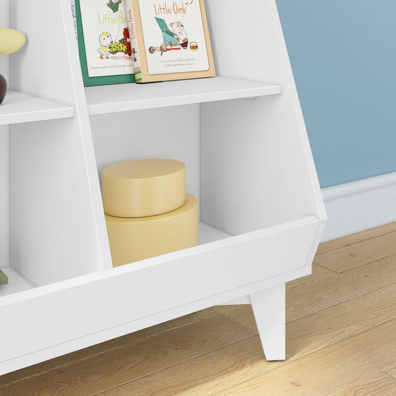 White mid-century modern kids bookshelf in a nursery with colorful children's books on the upper shelf, two yellow round storage boxes in the cubby, white tapered legs on light hardwood floor against a blue wall