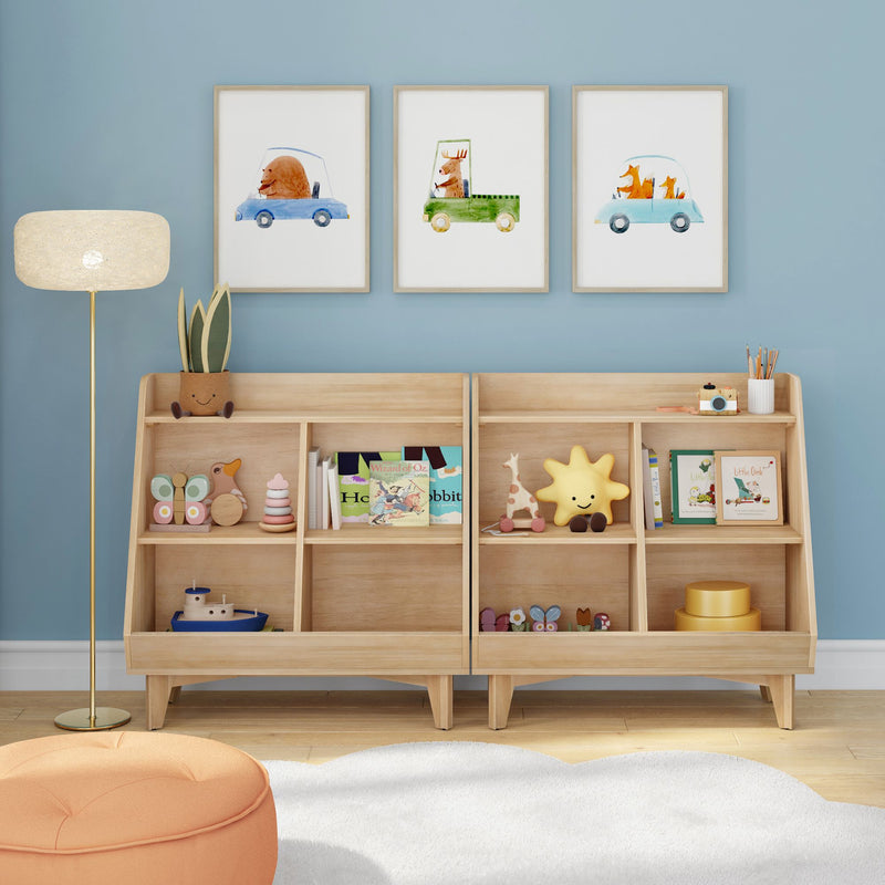 Wooden children's bookshelf and toy storage in a bright kids' nursery with blue accent wall, framed animal car prints, floor lamp, plush white rug, and assorted wooden toys, books and decor