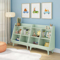 Mint green kids' toy bookshelf and storage organizer in a blue nursery with books, wooden toys, star plush, framed animal car prints and floor lamp