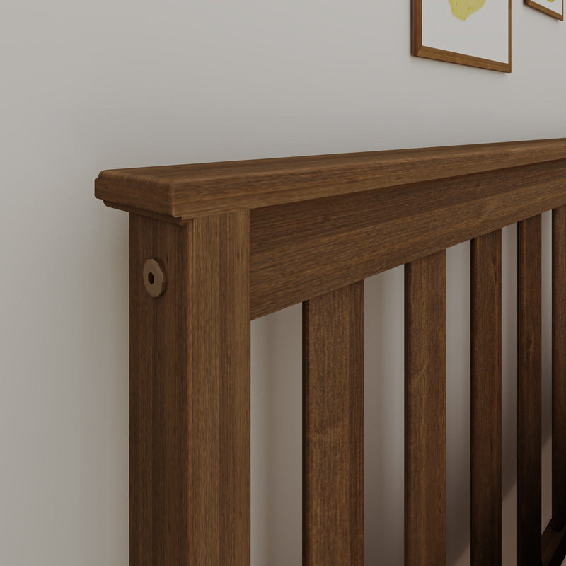 Wooden bed frame in dark wood finish with detailed craftsmanship displayed in angled view.