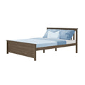 Brown wooden bed frame with light blue sheets, textured blue pillows and a white accent pillow on a white background