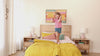 Kids playing and reading on different beds and bunk beds in bright, modern styled kids rooms. 