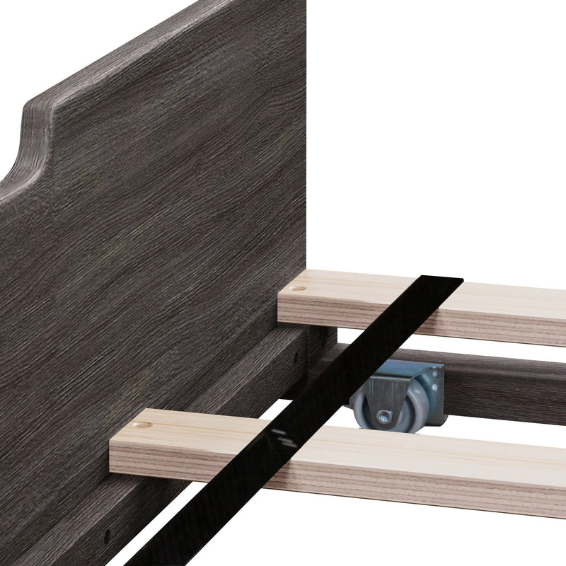 Close-up of a sturdy bed frame assembly with wooden slats and a metal caster wheel, designed for durability and easy mobility.